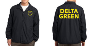 the figure of a man wearing a black FBI-style raid jacket. The jacket has the Delta Green circle logo in yellow on the front left breast and the words "DELTA GREEN" in large, yellow block letters on the back.
